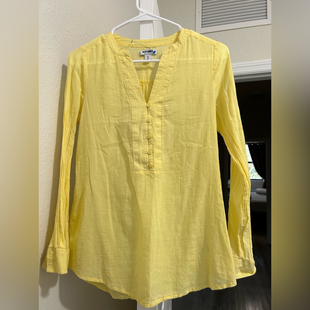Blusa mangas largas de tejido similar al lino